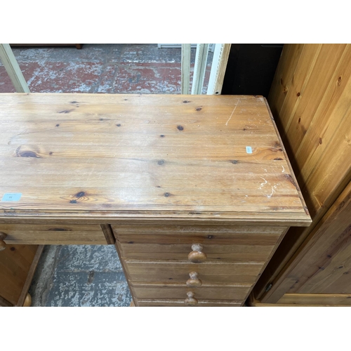 95 - A pine dressing table - approx. 77cm high x 137cm wide x 46cm deep