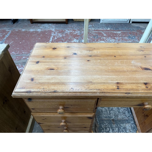 95 - A pine dressing table - approx. 77cm high x 137cm wide x 46cm deep