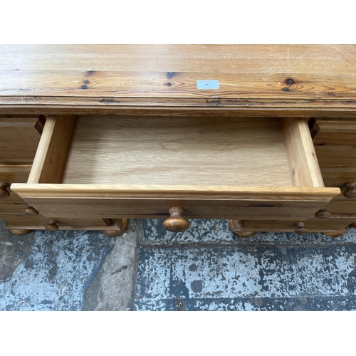 95 - A pine dressing table - approx. 77cm high x 137cm wide x 46cm deep