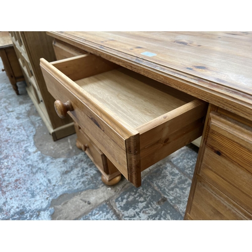 95 - A pine dressing table - approx. 77cm high x 137cm wide x 46cm deep