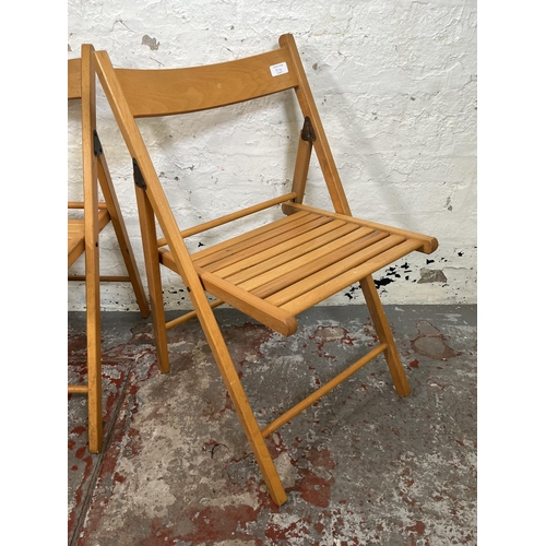 97A - Three beech folding chairs