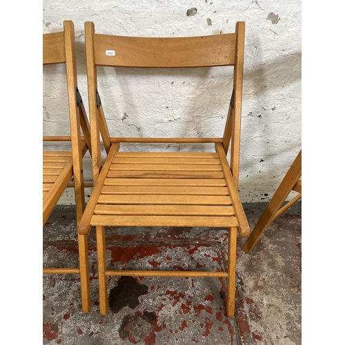 97A - Three beech folding chairs