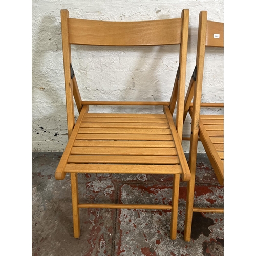 97A - Three beech folding chairs