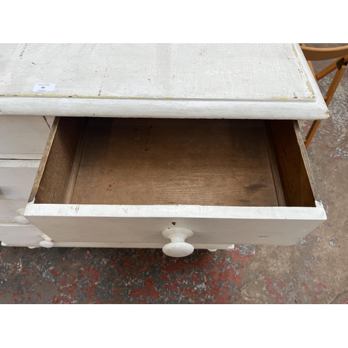 99 - A Victorian white painted pine chest of drawers - approx. 99cm high x 104cm wide x 50cm deep