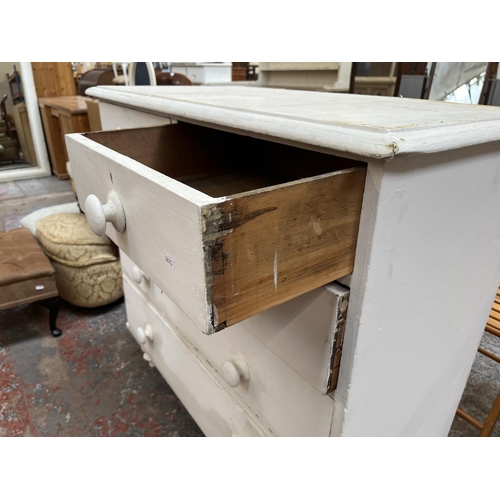 99 - A Victorian white painted pine chest of drawers - approx. 99cm high x 104cm wide x 50cm deep