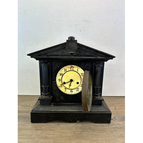 520 - A Victorian ebonised cased chiming mantel clock - approx. 35cm high x 34cm wide x 15cm deep