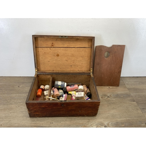 515 - A 19th century stained pine rectangular box containing a collection of vintage artist's equipment to... 