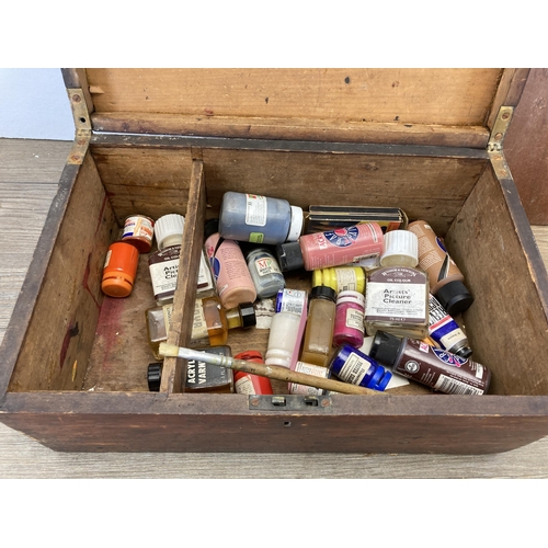 515 - A 19th century stained pine rectangular box containing a collection of vintage artist's equipment to... 