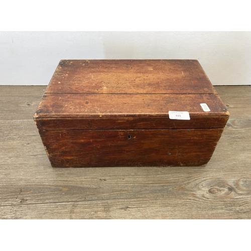 515 - A 19th century stained pine rectangular box containing a collection of vintage artist's equipment to... 