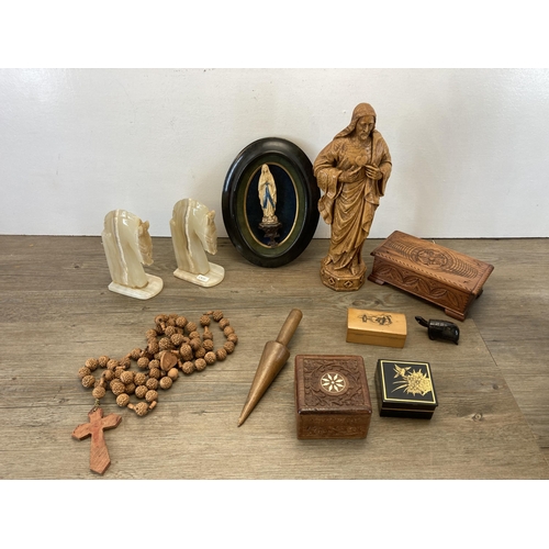 521 - A collection of items to include vintage carved wooden rosary beads, pair of carved alabaster horse ... 