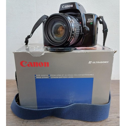 536 - A boxed Canon EOS 1000FN 35mm SLR camera fitted with Ultrasonic 1:4-5.6 35-105mm EF zoom lens