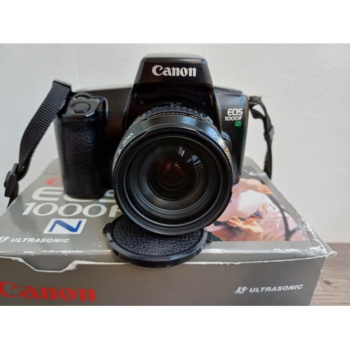 536 - A boxed Canon EOS 1000FN 35mm SLR camera fitted with Ultrasonic 1:4-5.6 35-105mm EF zoom lens