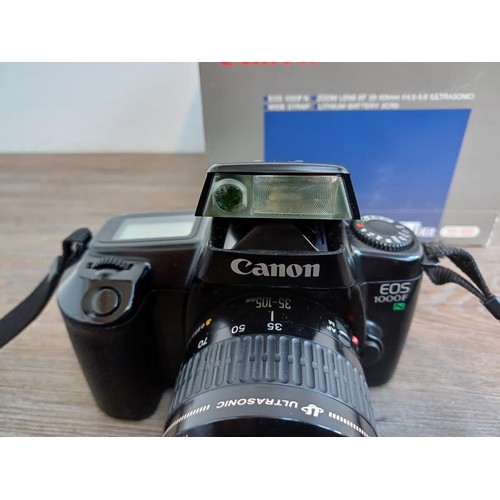 536 - A boxed Canon EOS 1000FN 35mm SLR camera fitted with Ultrasonic 1:4-5.6 35-105mm EF zoom lens