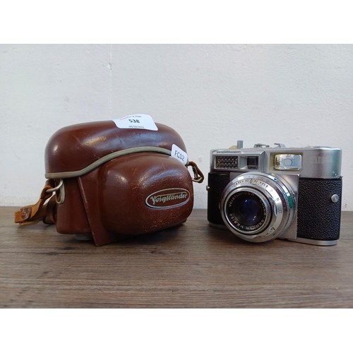 538 - A cased early 1960s Voigtländer Vitomatic IIa 35mm rangefinder camera fitted with Color-Skopar 1:2.8... 