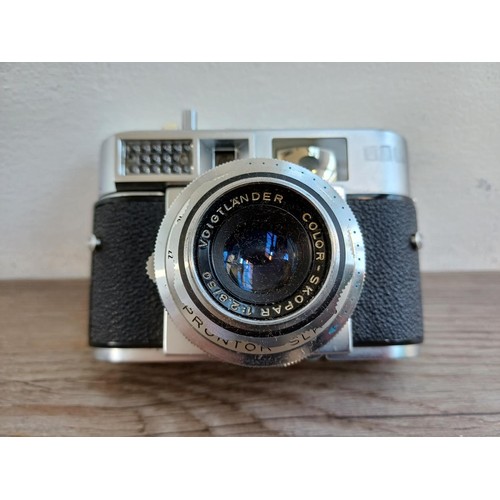 538 - A cased early 1960s Voigtländer Vitomatic IIa 35mm rangefinder camera fitted with Color-Skopar 1:2.8... 