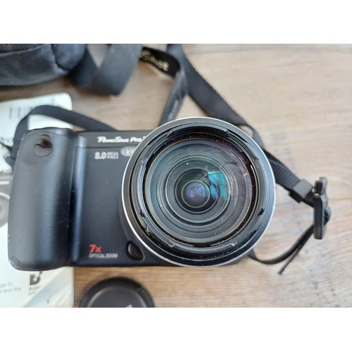 540 - A cased Canon PowerShot Pro 1 8mp digital camera fitted with Ultrasonic 1:2.4-3.5 7.2-50.8mm zoom le... 