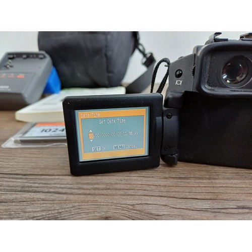 540 - A cased Canon PowerShot Pro 1 8mp digital camera fitted with Ultrasonic 1:2.4-3.5 7.2-50.8mm zoom le... 