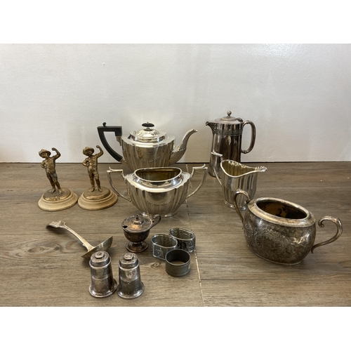 295 - A collection of metalware to include Victorian Daniel & Arter EPNS three piece tea set, horse brasse... 