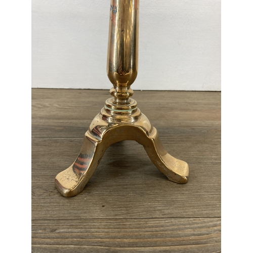 301 - A Victorian solid brass trivet stand on tripod base - approx. 28cm high x 23.5cm diameter