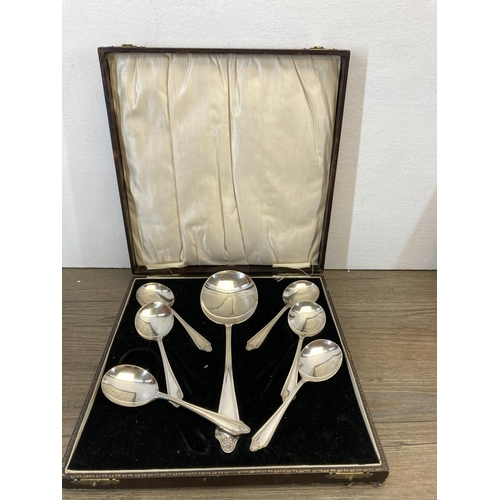 305 - Three vintage cased cutlery sets