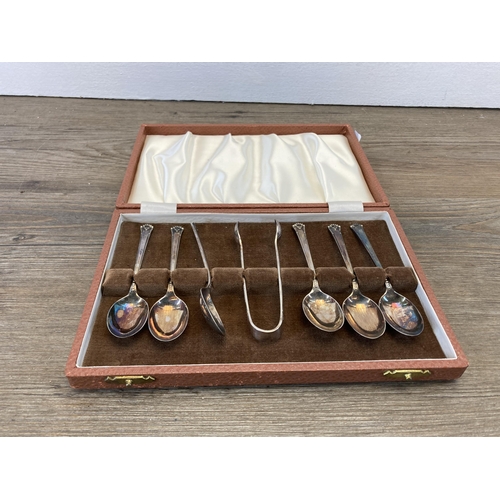 305 - Three vintage cased cutlery sets