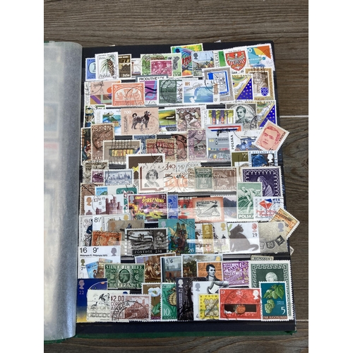 435 - Three stamp albums containing a collection of worldwide stamps