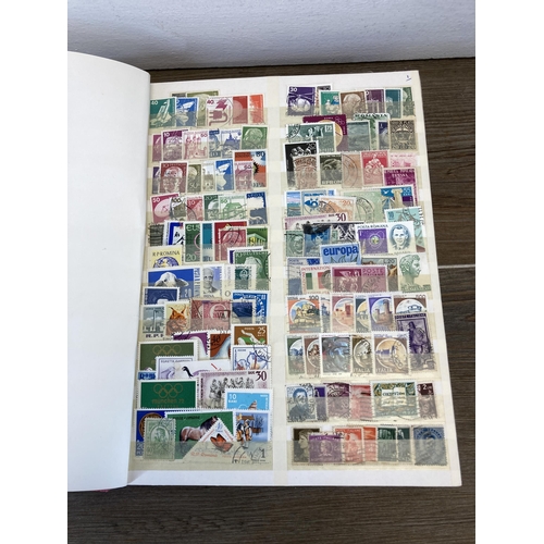 435 - Three stamp albums containing a collection of worldwide stamps