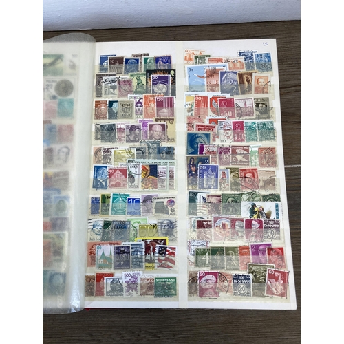 435 - Three stamp albums containing a collection of worldwide stamps