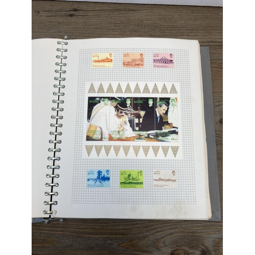 440 - A stamp album containing a collection of worldwide stamps