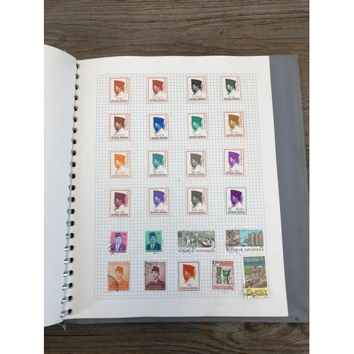 440 - A stamp album containing a collection of worldwide stamps