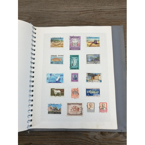 440 - A stamp album containing a collection of worldwide stamps