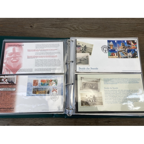 442 - Three first day cover albums containing a collection of first day covers to include Grand Prix, Brit... 