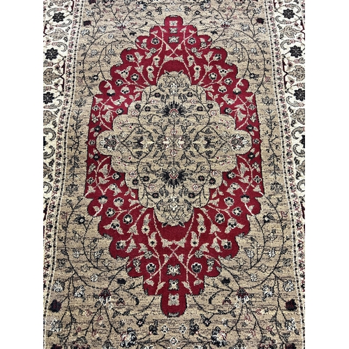 152 - A Carmel Ziggler rug - approx. 117cm x 170cm