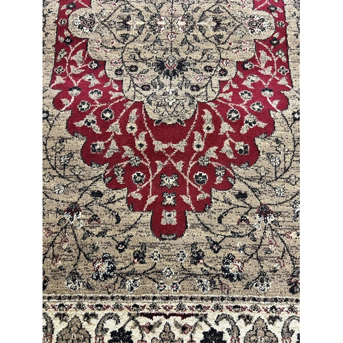 152 - A Carmel Ziggler rug - approx. 117cm x 170cm