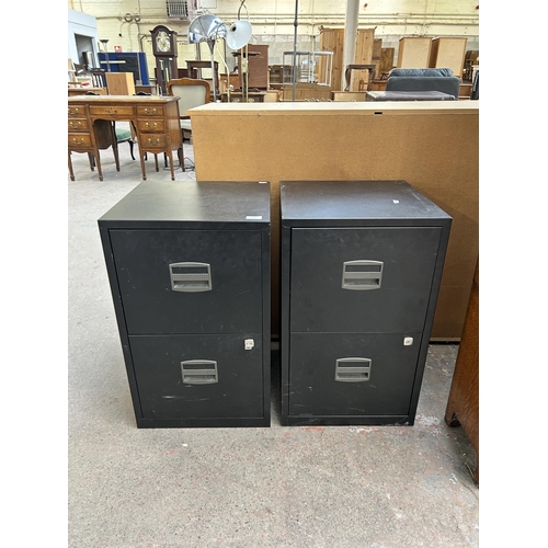 156 - A pair of black metal two drawer office filing cabinets - approx. 67cm high x 41cm wide x 40cm deep