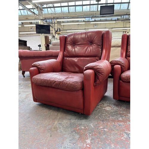 156A - A pair of mid 20th century Gimson Slater Collection red leather armchairs