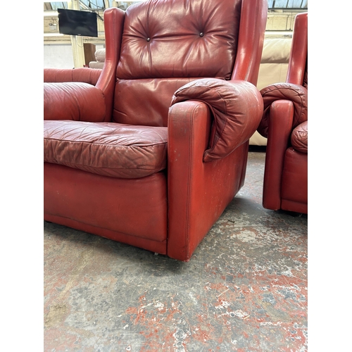 156A - A pair of mid 20th century Gimson Slater Collection red leather armchairs