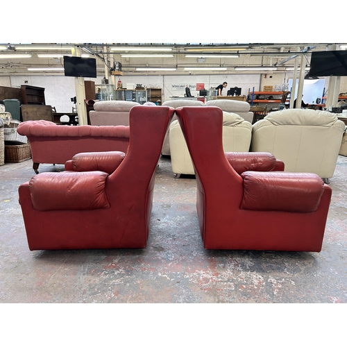 156A - A pair of mid 20th century Gimson Slater Collection red leather armchairs