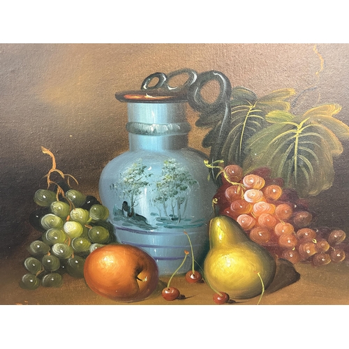 169 - A 20th century gilt framed fruit still life oil on canvas - approx. 42cm high x 52cm wide