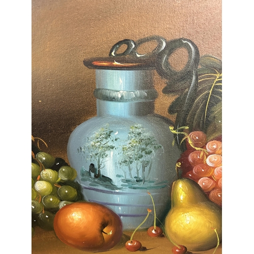 169 - A 20th century gilt framed fruit still life oil on canvas - approx. 42cm high x 52cm wide