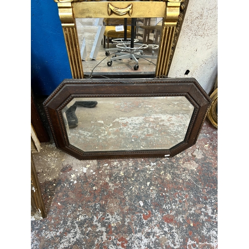 171 - Four framed bevelled edge wall mirrors, three gilt framed and one oak framed