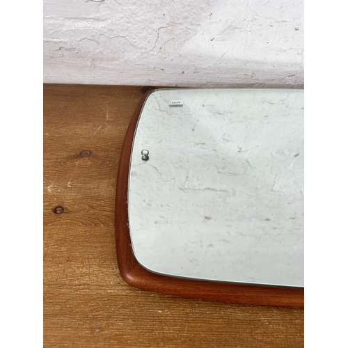 178 - A mid 20th century teak framed wall mirror - approx. 67cm high x 38cm wide