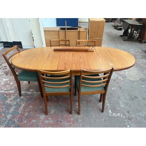 81B - A mid 20th century teak extending dining table and five chairs - approx. 74cm high x 92cm wide x 198... 