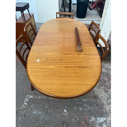 81B - A mid 20th century teak extending dining table and five chairs - approx. 74cm high x 92cm wide x 198... 