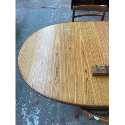 81B - A mid 20th century teak extending dining table and five chairs - approx. 74cm high x 92cm wide x 198... 