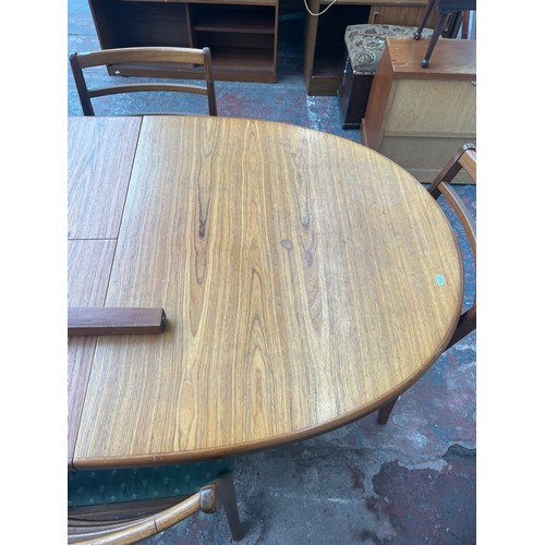 81B - A mid 20th century teak extending dining table and five chairs - approx. 74cm high x 92cm wide x 198... 