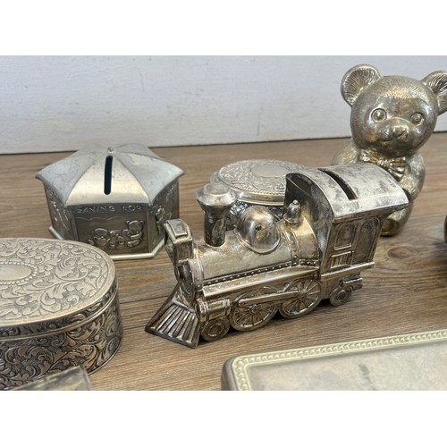 315A - A collection of metal boxes to include money box, trinket box etc.