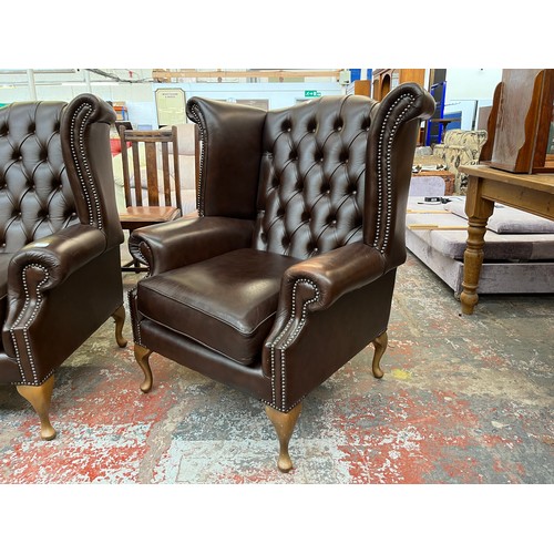 151 - A Buffalo brown leather Chesterfield wingback armchair on cabriole supports - approx. 103cm high x 9... 