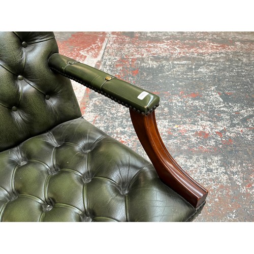 151D - A green leather and mahogany Chesterfield swivel office desk chair - approx. 96cm high x 61cm wide x... 