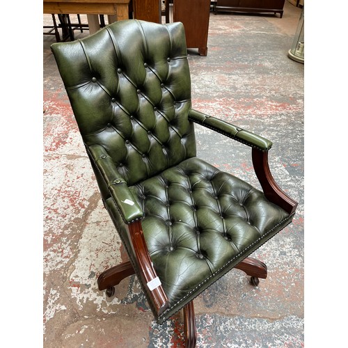 151E - A green leather and mahogany Chesterfield swivel office desk chair - approx. 96cm high x 61cm wide x... 